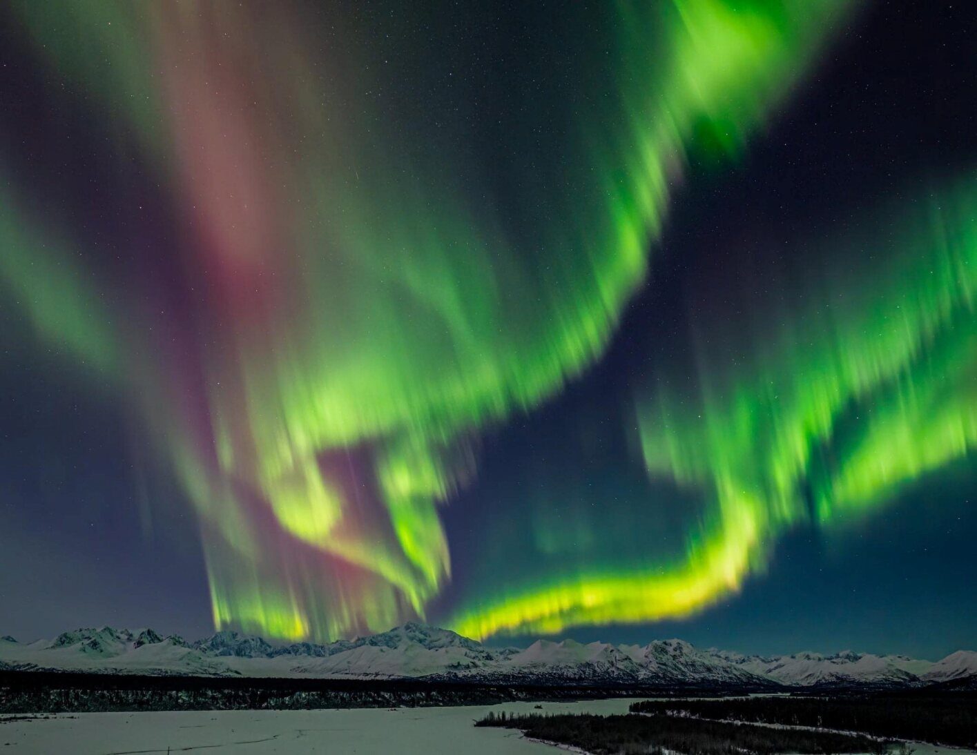 Green northern lights over Mt. Denali in winter, seen from ARK@Denali